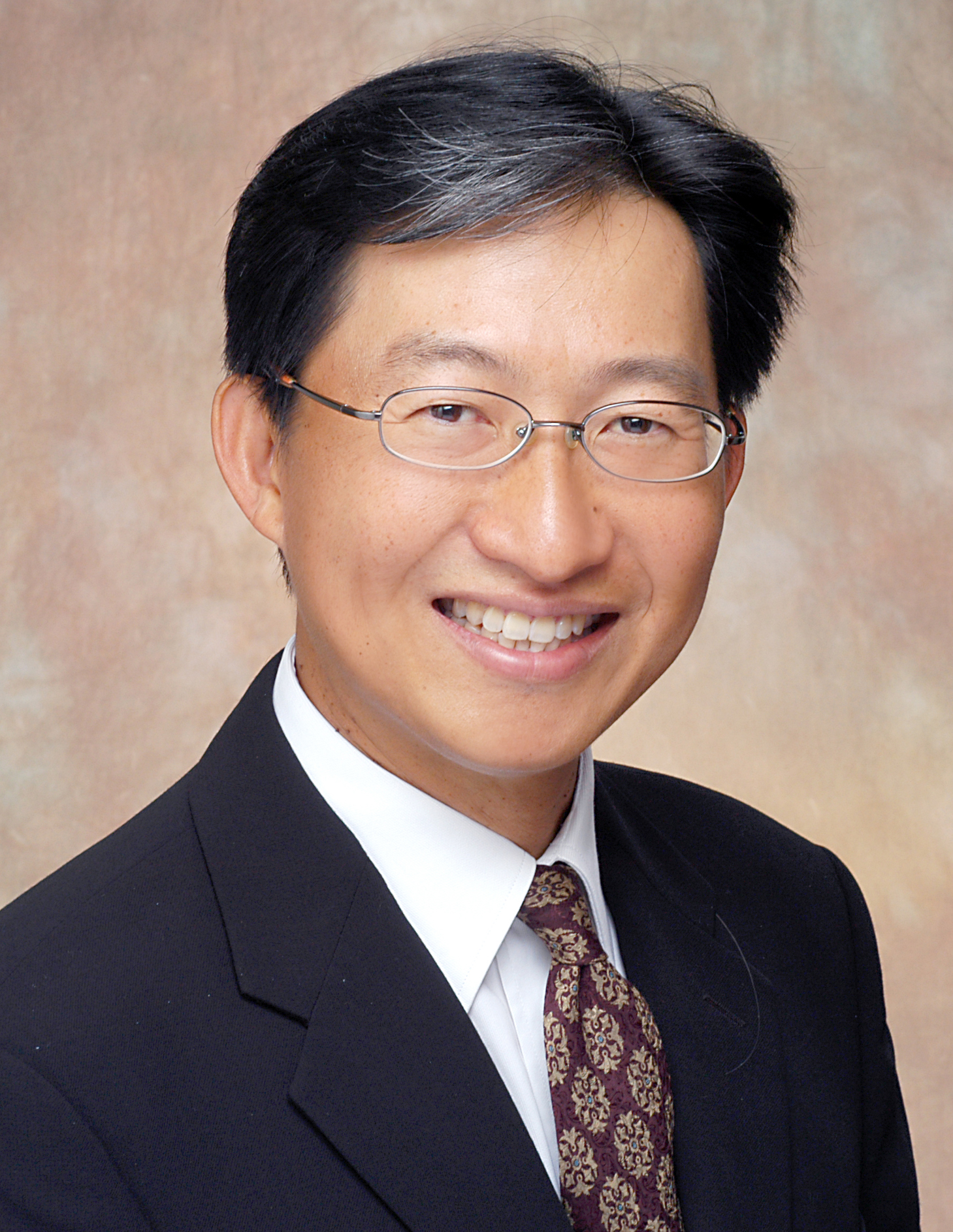 Dr. David K L Tay
